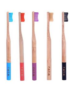 from earth to earth adult medium bristle toothbrushes, shown in red, blue and purple , natural  & charcoal