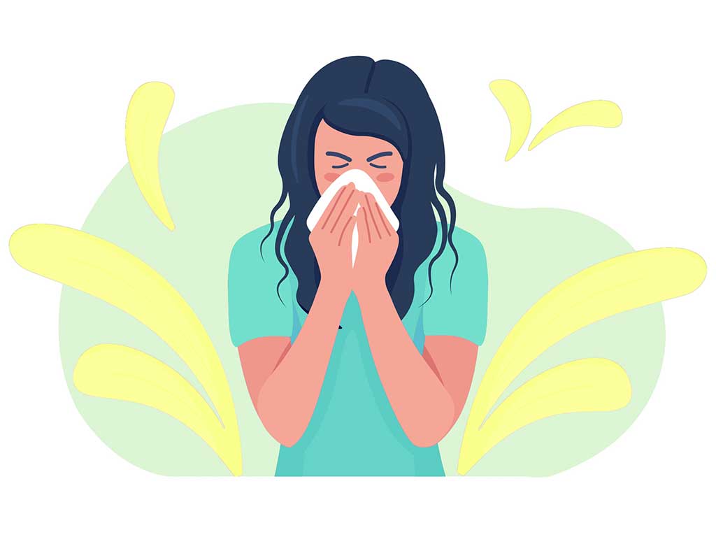 Lady sneezing due to pollen