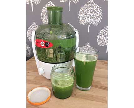 Cabbage Juice with glass & jar freshly made